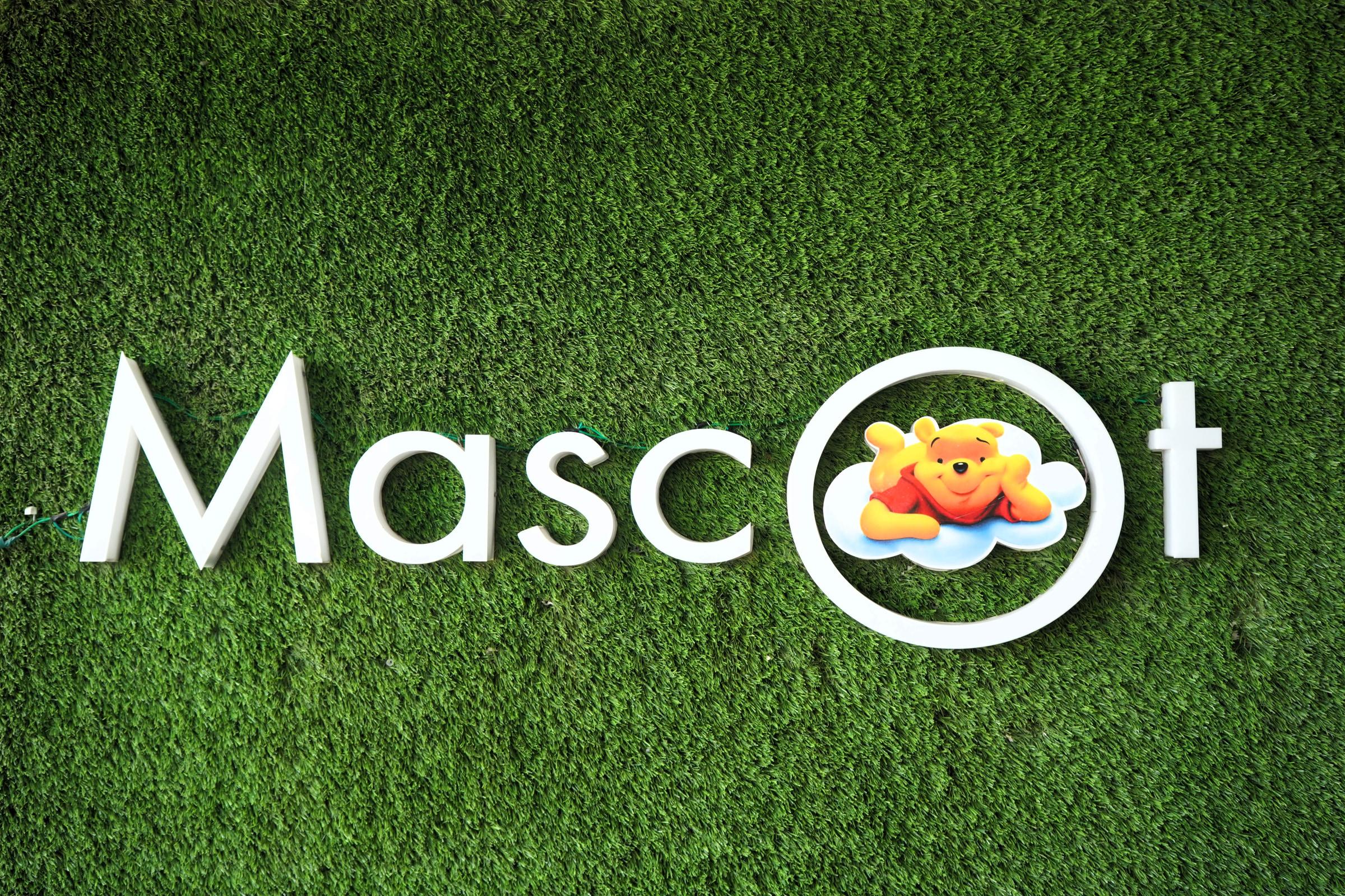 The Mascot mark on the turf wall at the Kharar shop