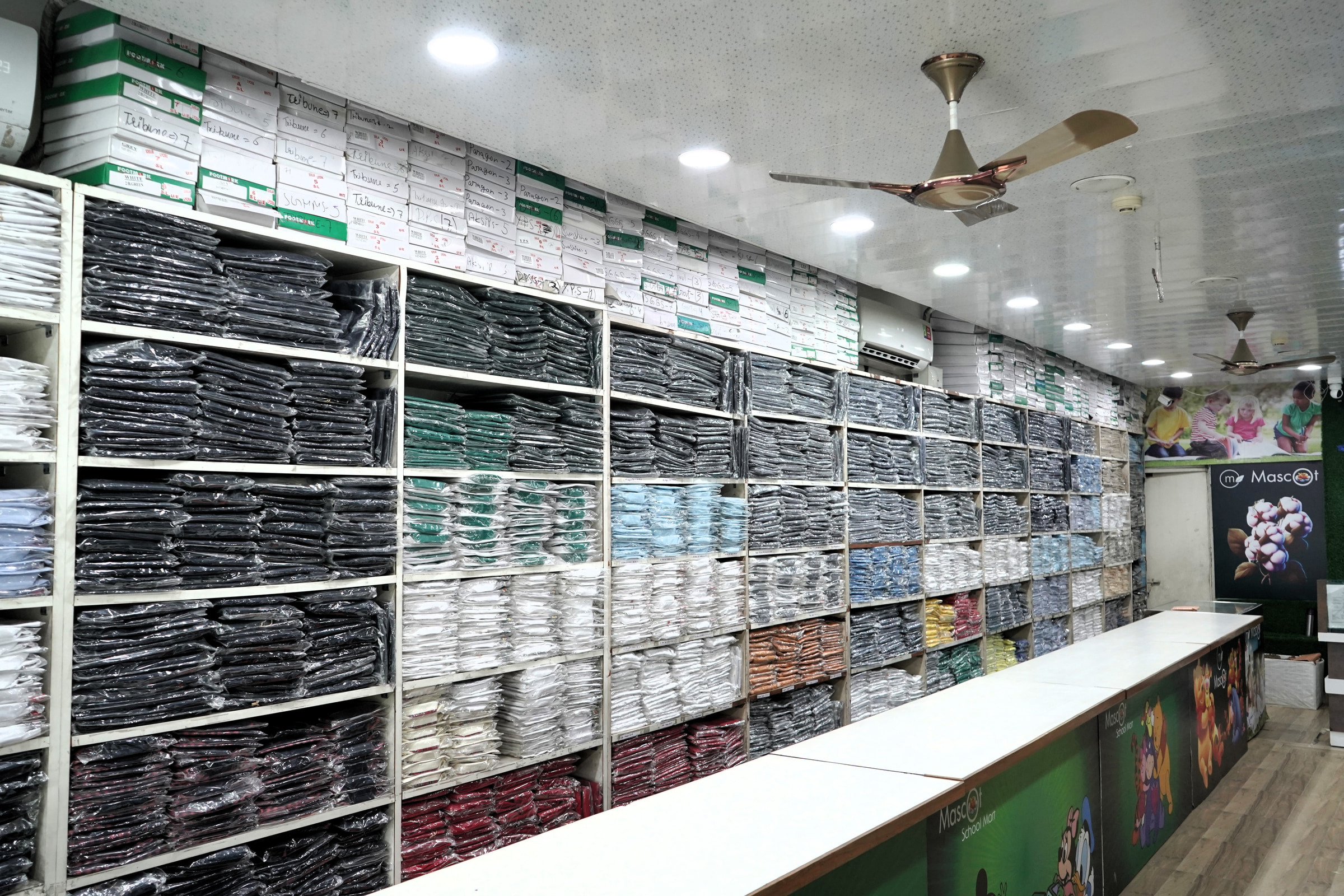 The Sector 35 floor, shelving the length of one wall