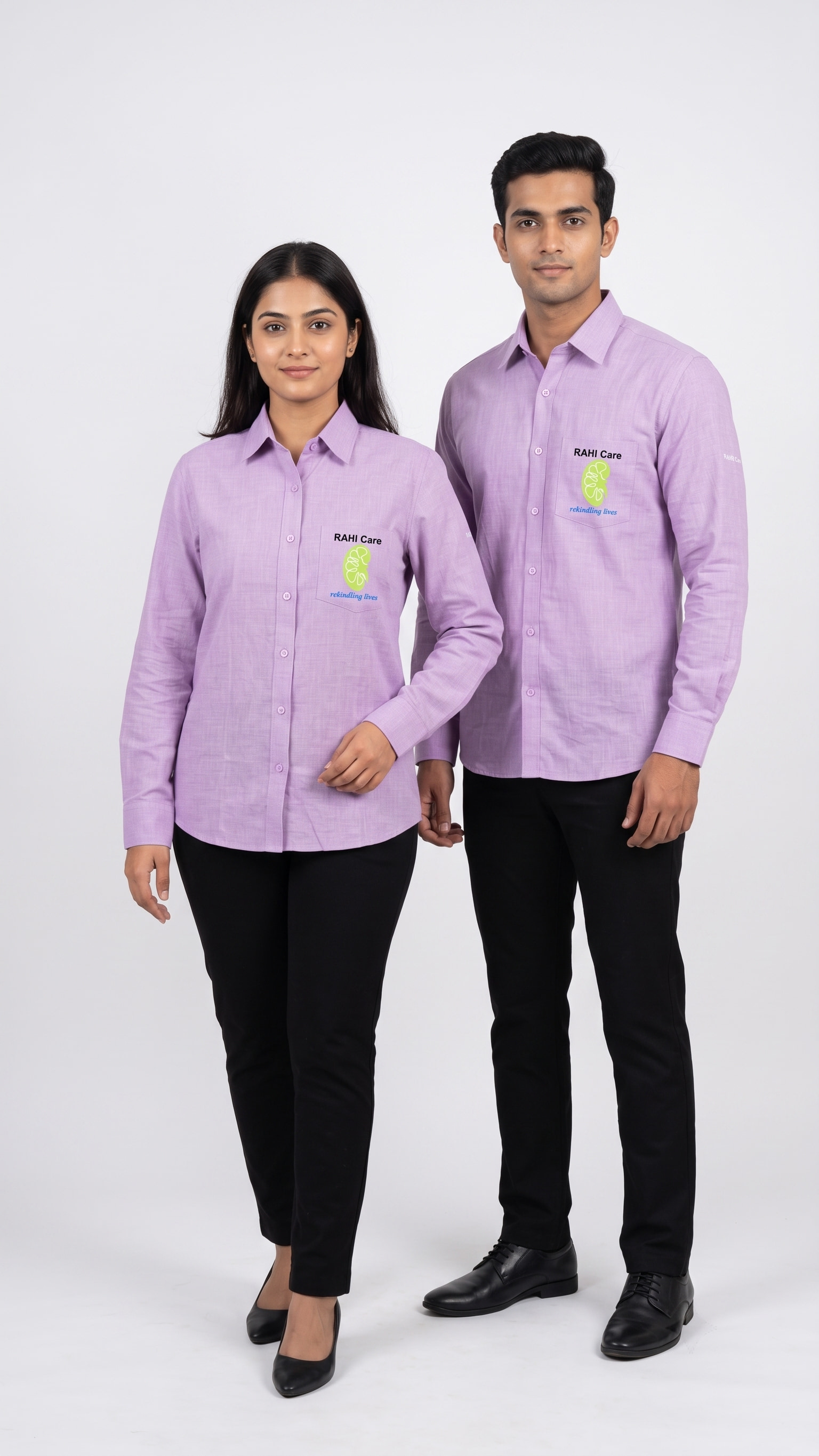 Lilac cotton shirting over black trousers. Soft at close quarters, colour-fast through a clinical wash.